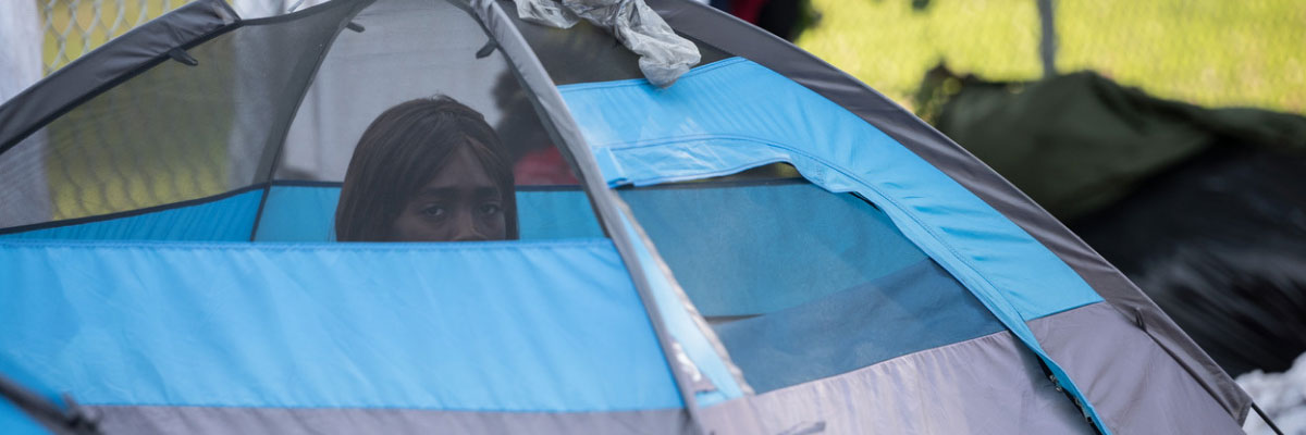 Woman in blue tent